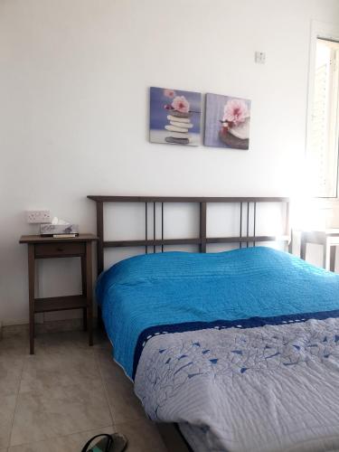 Ένα ή περισσότερα κρεβάτια σε δωμάτιο στο Sea Heart Villa Beachfront