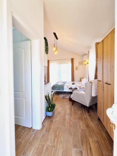 Ένα ή περισσότερα κρεβάτια σε δωμάτιο στο Sunny Side Apartments