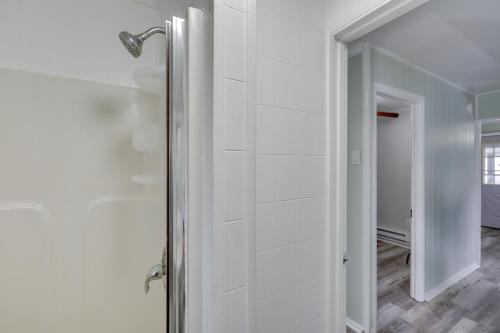 a bathroom with a shower with a glass door at Wildwood Apartment, Walk to Crest Pier and Beach! in Wildwood