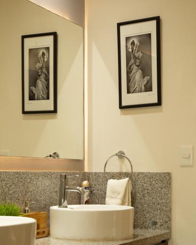 a bathroom with two sinks and a mirror at Gorgeous 15 Floor Grand Venetian in Puerto Vallarta