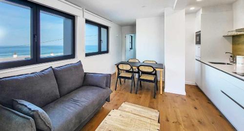Η κουζίνα ή μικρή κουζίνα στο AG Casa Arnados,1ª linea de playa Razo con jardín