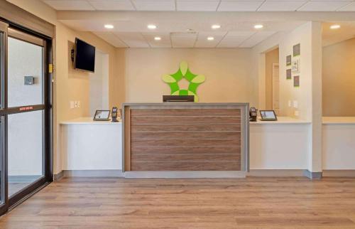 a lobby with a reception desk and a front door at Extended Stay America Suites - Baytown in Baytown