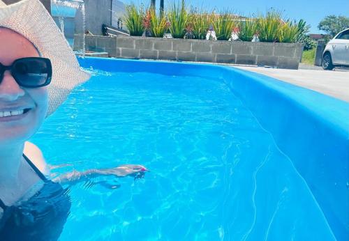 Kolam renang di atau dekat dengan Casa com piscina Itapoá Itapema do Norte