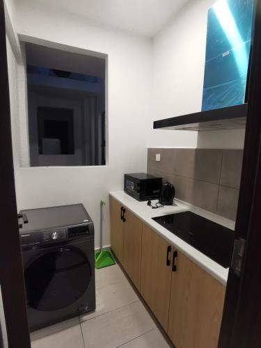 Кухня или мини-кухня в K AVENUE FAMILY ROOM B09 near airport by Gc
