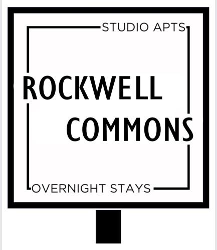 un cartello stradale con le parole "Rolexwell Commonsowment" rimane. di Rockwell Commons 