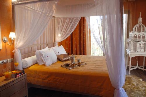 Posteľ alebo postele v izbe v ubytovaní Olympic Fashion Hotels