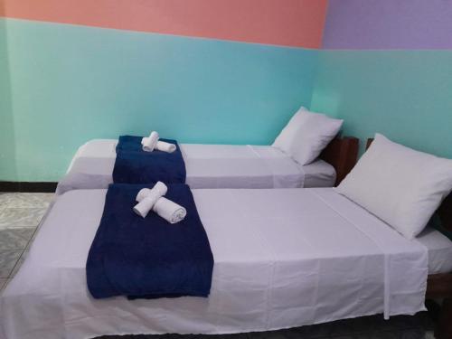 מיטה או מיטות בחדר ב-Rancho JL