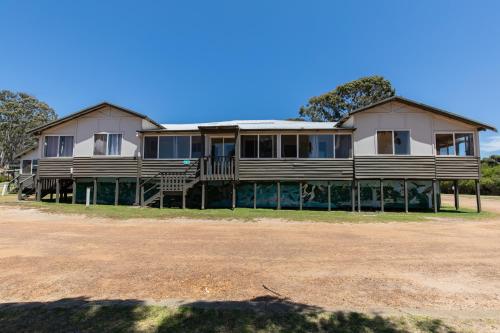 a large house on the side of a road at Walpole Rest Point Caravan Park in Walpole