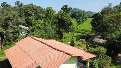 an overhead view of a house with an orange roof at Panoramic Royal Villa in Sigiriya