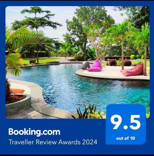 a picture of a swimming pool in a resort at La Collina Villa in Jepara