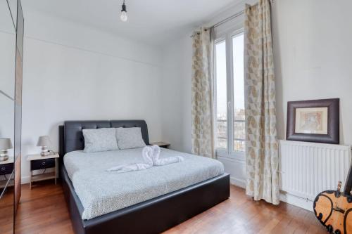 Кровать или кровати в номере Charmant Appart hyper centre Gare 6pers