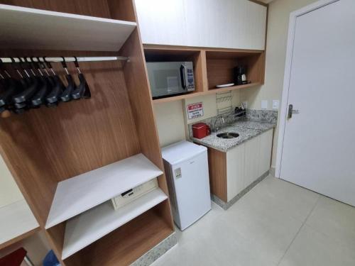Una cocina o zona de cocina en Spazzio diRoma RM Hospedagem com Acesso Acqua Park/Splash