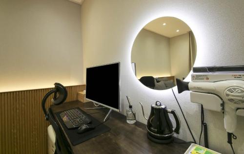 Телевизор и/или развлекательный центр в Hey Gunsan Hotel