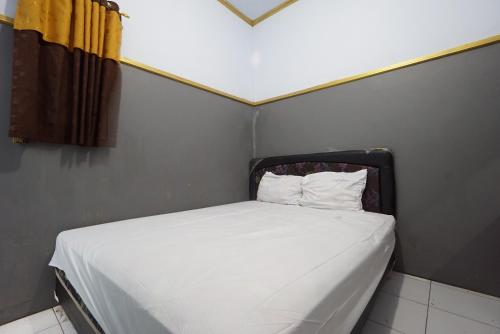 Фотография из галереи SPOT ON 93620 Anisa Homestay Syariah Near Pantai Gemah Tulungaggung в городе Тулунгагунг