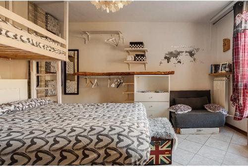 Un pat sau paturi într-o cameră la La Lanterna sui Monti