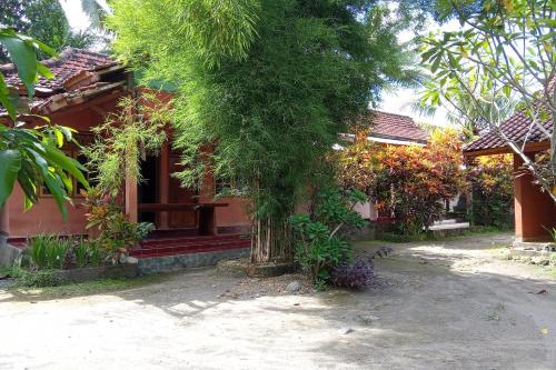 Taman di luar Hotel O Dannis Homestay Near Musholla Al Istiqomah Terawangan