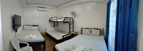 Postel nebo postele na pokoji v ubytování Amage resort