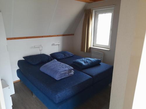 Postel nebo postele na pokoji v ubytování t'Hoog Holt