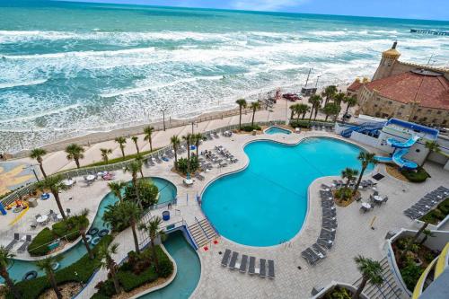 an overhead view of a pool and the ocean at Beachfront Luxury Villa Ocean Walk Resort Daytona in Daytona Beach