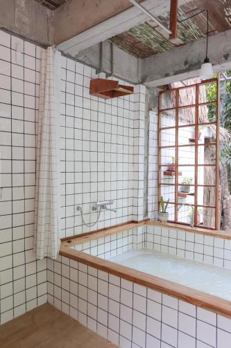 Un baño de Woo Ma Ca Moo