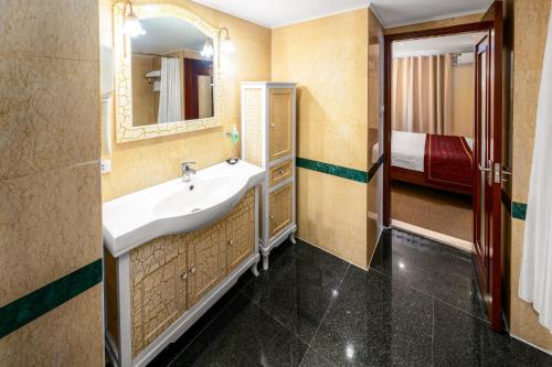 Koupelna v ubytování EDEN HOTEL HÀ NỘI
