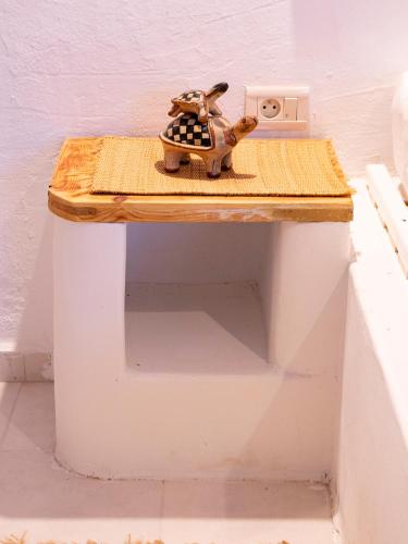 a toy turtle sitting on top of a table at Dar Yessine Boutique Hôtel in Sousse