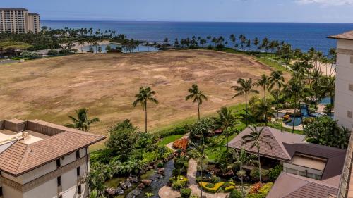 an aerial view of a resort and the ocean at Ko Olina Beach Villas O1111 in Kapolei