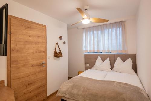 Ένα ή περισσότερα κρεβάτια σε δωμάτιο στο Hotel Modus