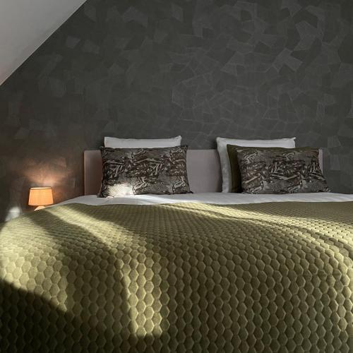 Ένα ή περισσότερα κρεβάτια σε δωμάτιο στο Fletcher Hotel-Restaurant Oud London