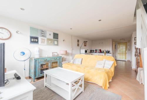 En eller flere senge i et værelse på Maison dans résidence calme + piscine à Pornic