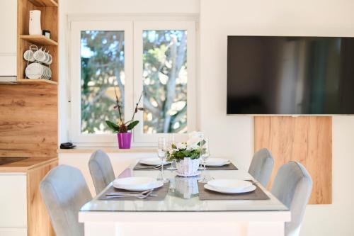 TV a/nebo společenská místnost v ubytování Apartma Morje