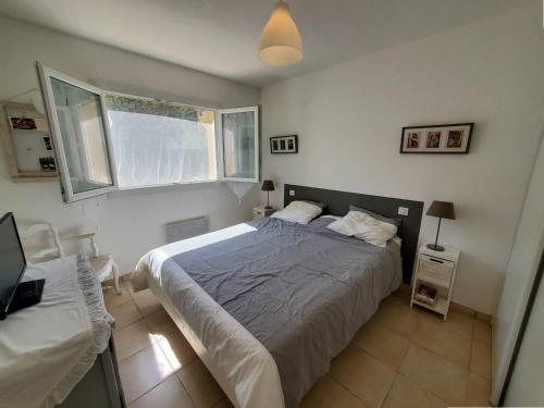 Postel nebo postele na pokoji v ubytování Villa club 2 chambres avec grande terrasse dans résidence de vacances