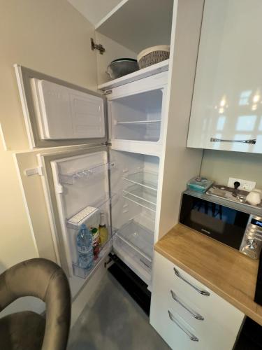 Küche/Küchenzeile in der Unterkunft Apartments Adamas