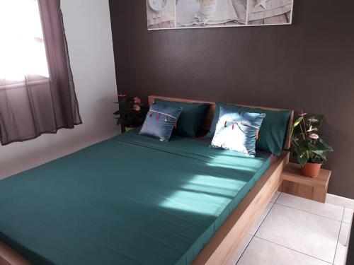 Postel nebo postele na pokoji v ubytování Villa l'îlot du sud avec piscine