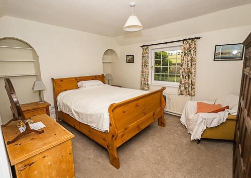En eller flere senge i et værelse på West Lodge 3 bedrooms, near golf course and river