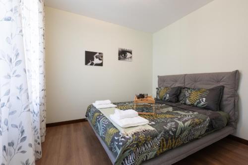 a living room with a couch in a room at Didi's Central Designer Apartments in Sofia