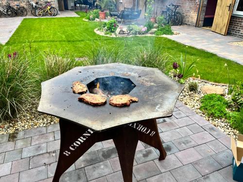 Kemudahan BBQ tersedia untuk tetamu di apartmen