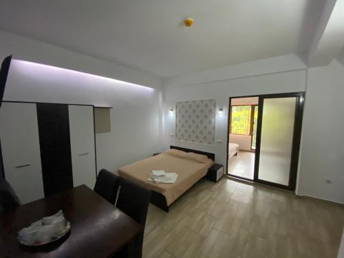 Ένα ή περισσότερα κρεβάτια σε δωμάτιο στο Vila Leul