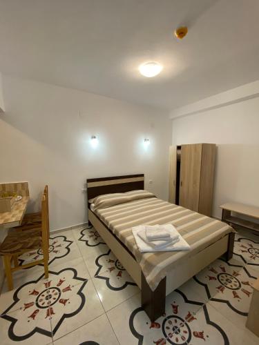 Ένα ή περισσότερα κρεβάτια σε δωμάτιο στο Vila Leul