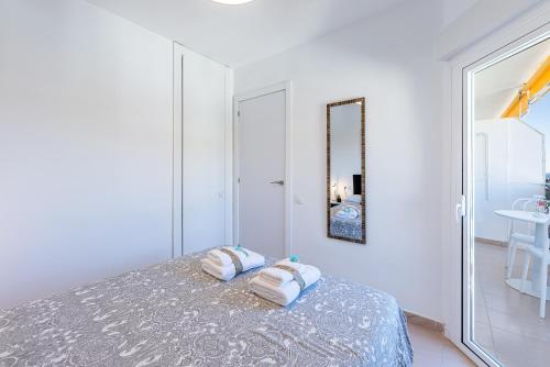 Llit o llits en una habitació de 797 HOLIDAY RENTALS - acogedor apartamento con hermosas vistas