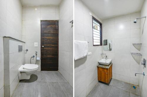 a bathroom with a toilet and a sink at Hotel HC Dream Majestic in Mohali