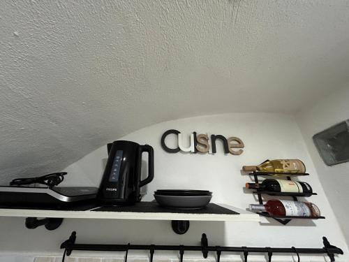 a shelf above a stove with a coffee maker on it at Cantovì in Bari