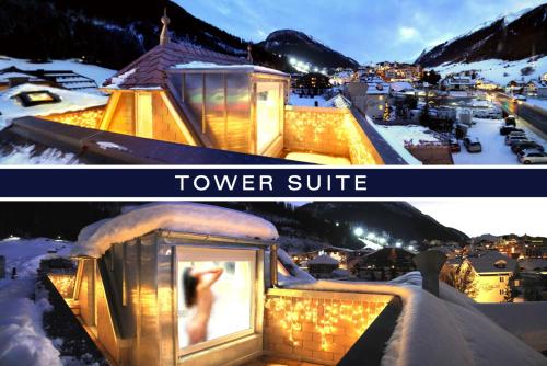 a woman in a lantern on top of a snow covered roof at Grütter Luxury Apartments in Ischgl