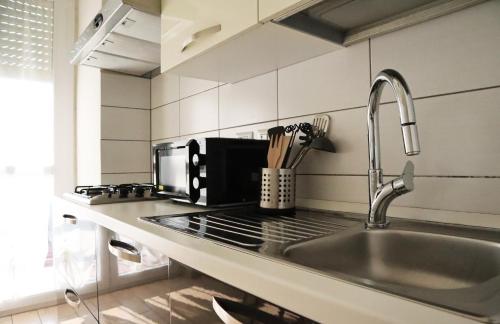 Kjøkken eller kjøkkenkrok på Corsico Comfort Home