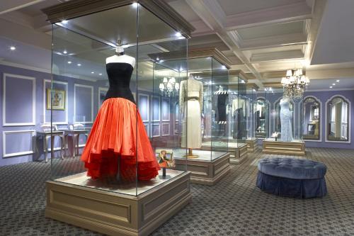 a room with a dress in a display case at The Queen Mary in Long Beach