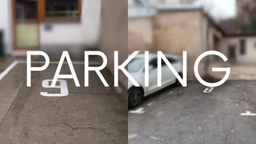 a picture of the word parking next to a car at Danubia Gate Hotel in Bratislava