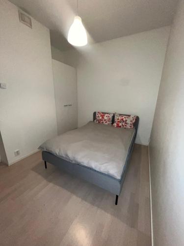 Tempat tidur dalam kamar di Apartament hotel
