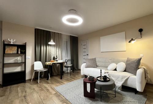 Posezení v ubytování New Charm Apartments near Border