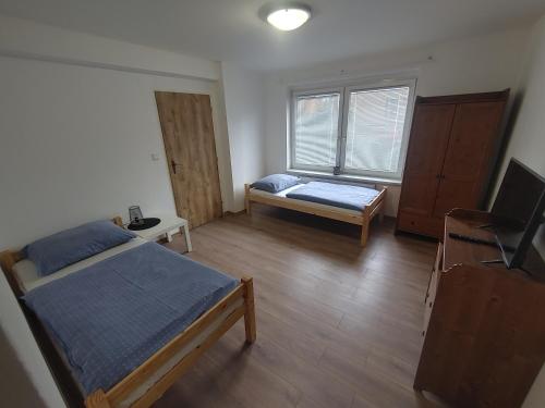 Кровать или кровати в номере Privat Apartment Zdenko