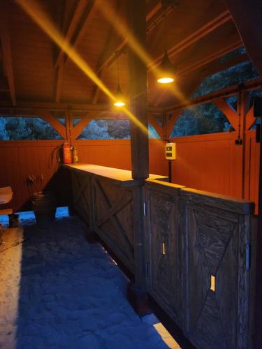 an inside view of a building with a wooden porch at Jak Tu Sielsko in Osiek